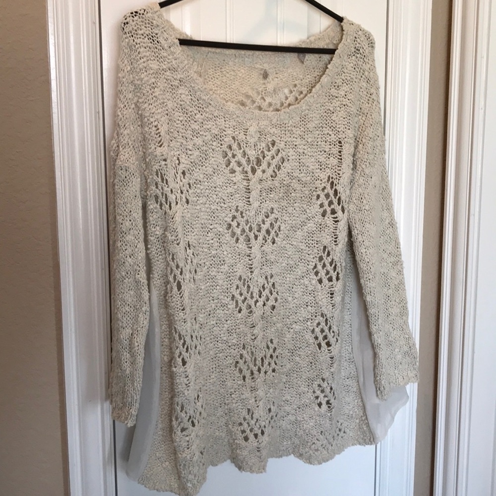Knitted and knotted Anthropologie sweater